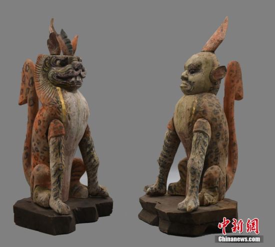 圖為慕容智墓出土鎮(zhèn)墓獸。 中新社發(fā) 甘肅省文物局 供圖